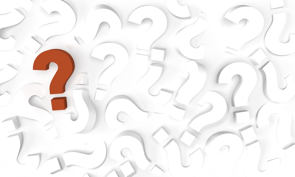 White question marks with one red question mark on white background. Representing FAQs about a Florence electrician. 
