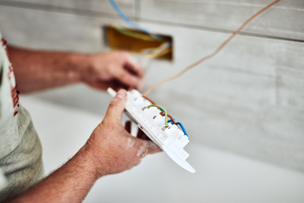 Electrician fixing wires. | Emergency Electrical Repair