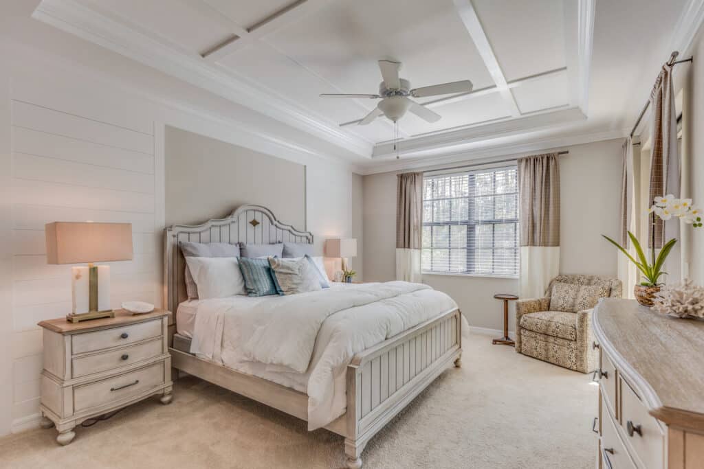 Ceiling fan installation in the bedroom.